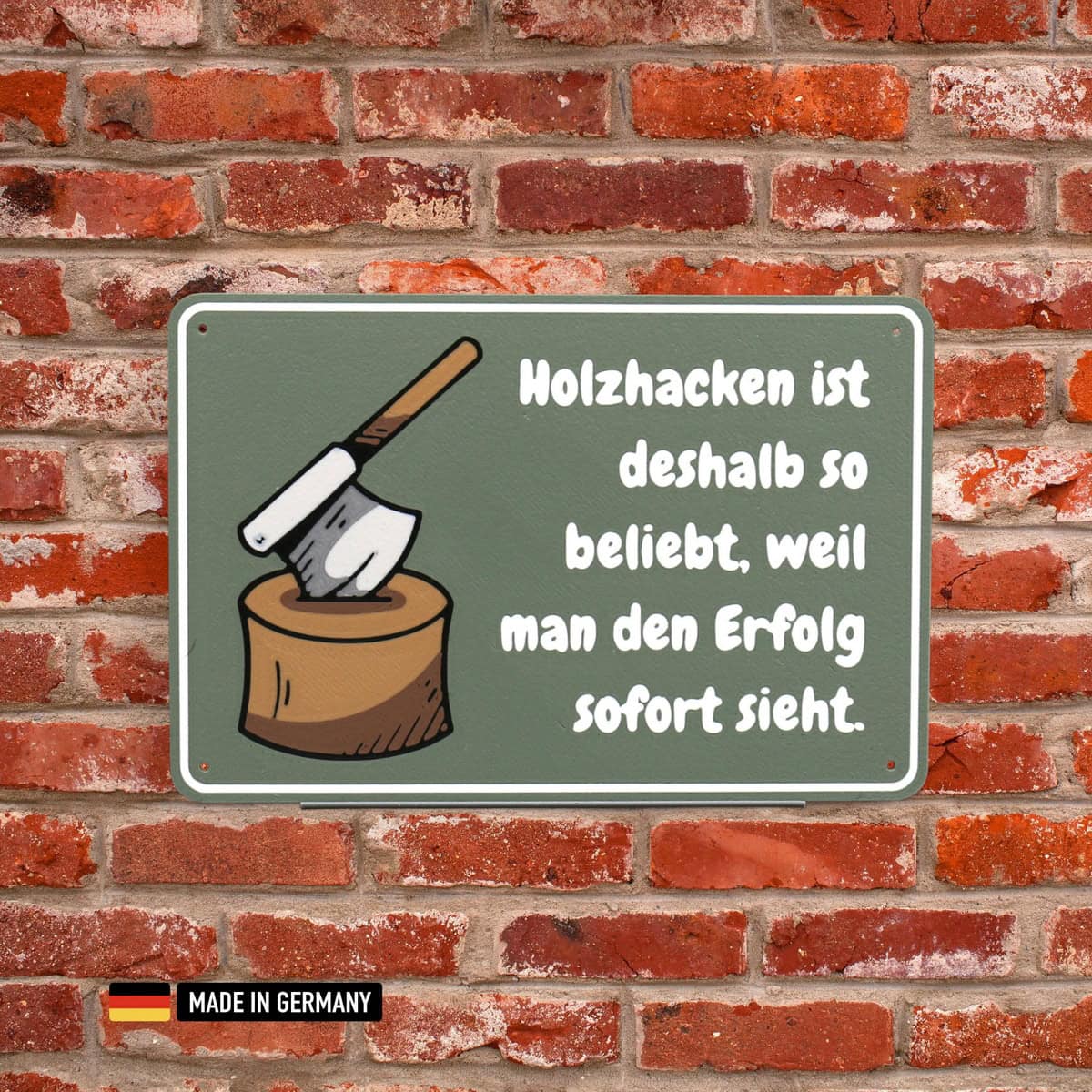 schild: holzhacken ist deshalb so beliebt, weil man den erfolg sofort sieht