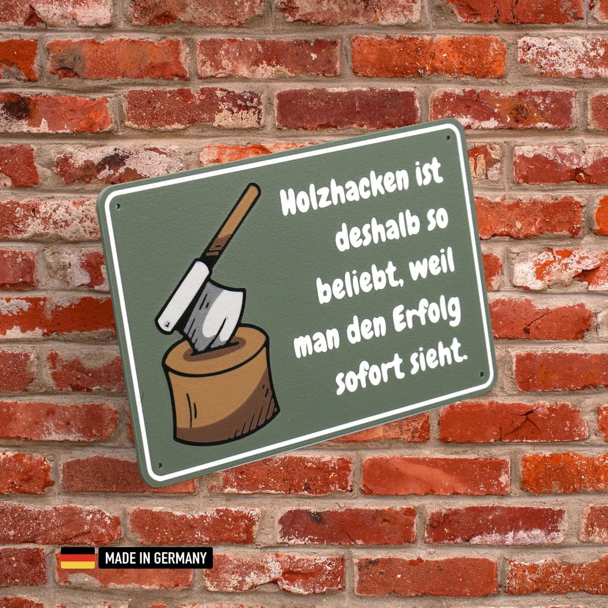 schild: holzhacken ist deshalb so beliebt, weil man den erfolg sofort sieht