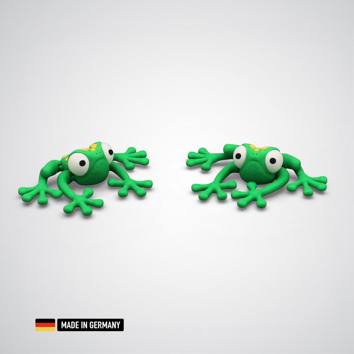 frosch figur grün mit gelben punkten und bewegliche gliedmaßen / dekorations tierfigur