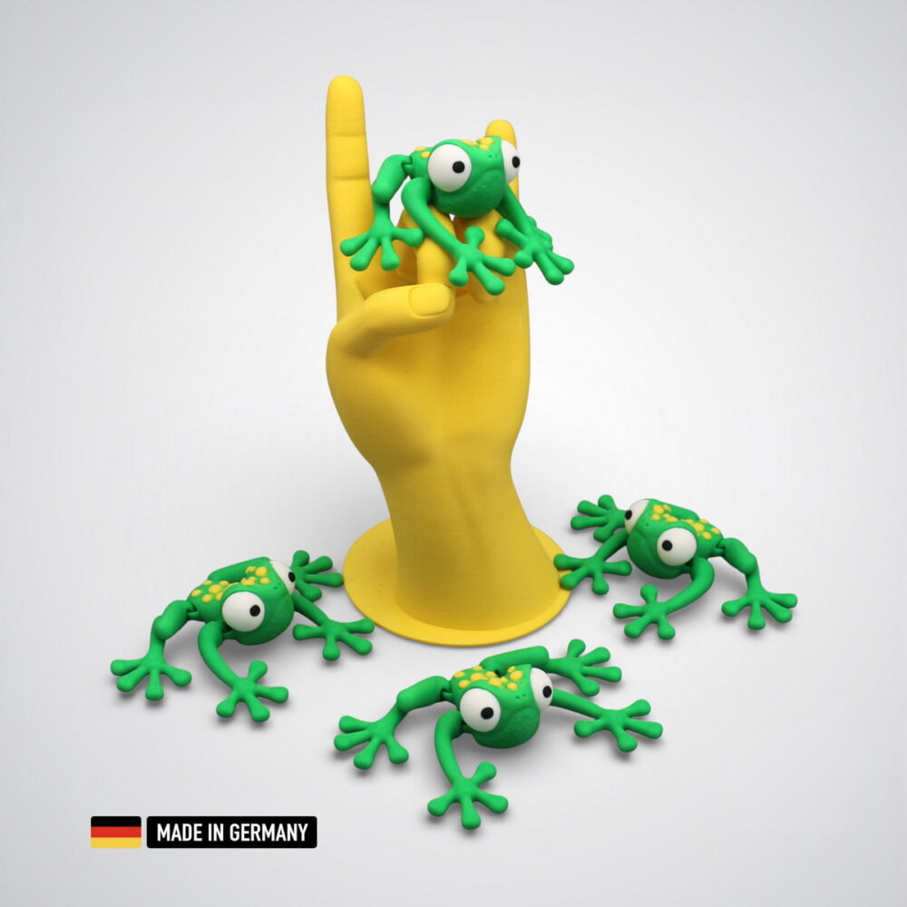 frosch figur grün mit gelben punkten und bewegliche gliedmaßen / dekorations tierfigur