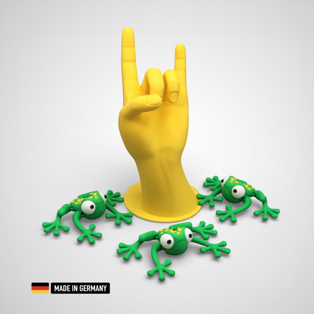 frosch figur grün mit gelben punkten und bewegliche gliedmaßen / dekorations tierfigur