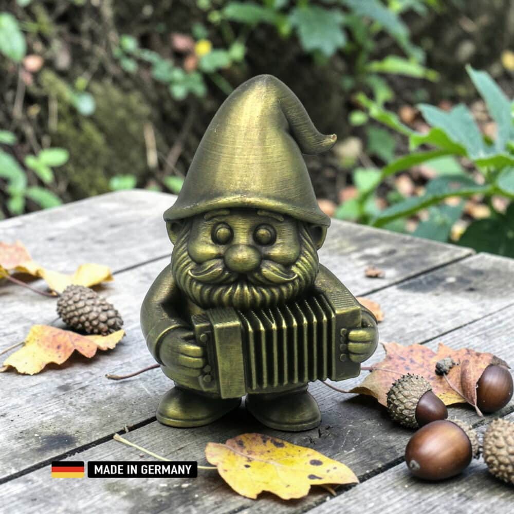 musiker gnom mit akkordeon – dekofigur für garten, beet und fensterbank