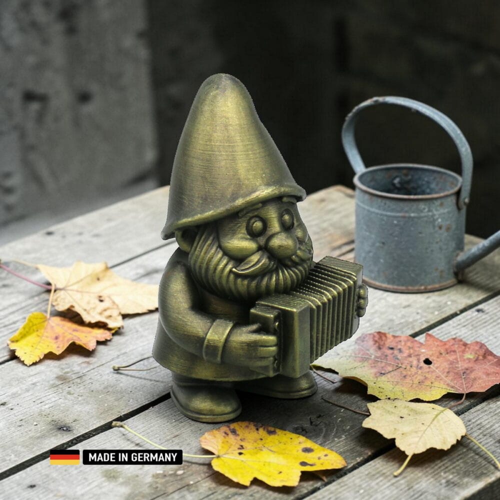 musiker gnom mit akkordeon – dekofigur für garten, beet und fensterbank