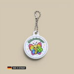 regenbogen schmetterling glücksbringer schlüsselanhänger mit glücks kleeblatt farbenpracht