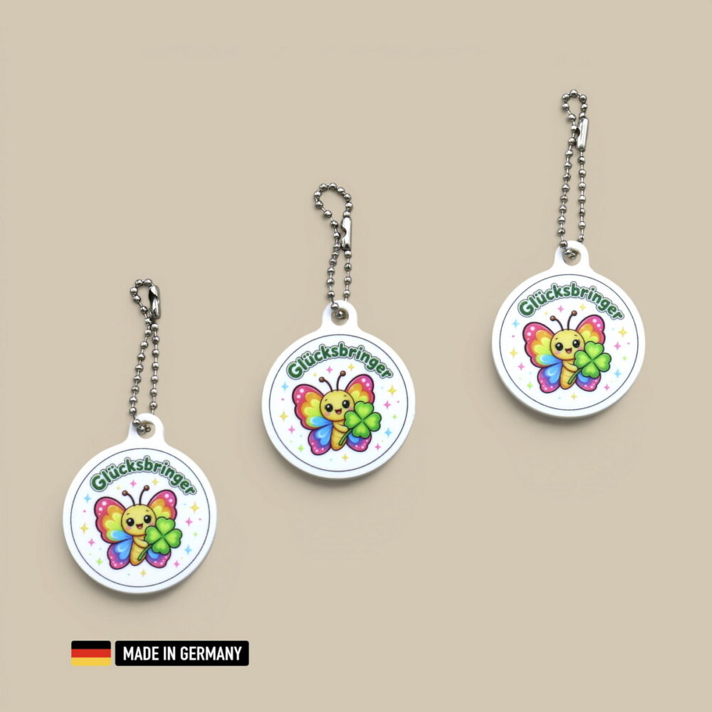 regenbogen schmetterling glücksbringer schlüsselanhänger mit glücks kleeblatt farbenpracht