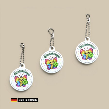 regenbogen schmetterling glücksbringer schlüsselanhänger mit glücks kleeblatt farbenpracht