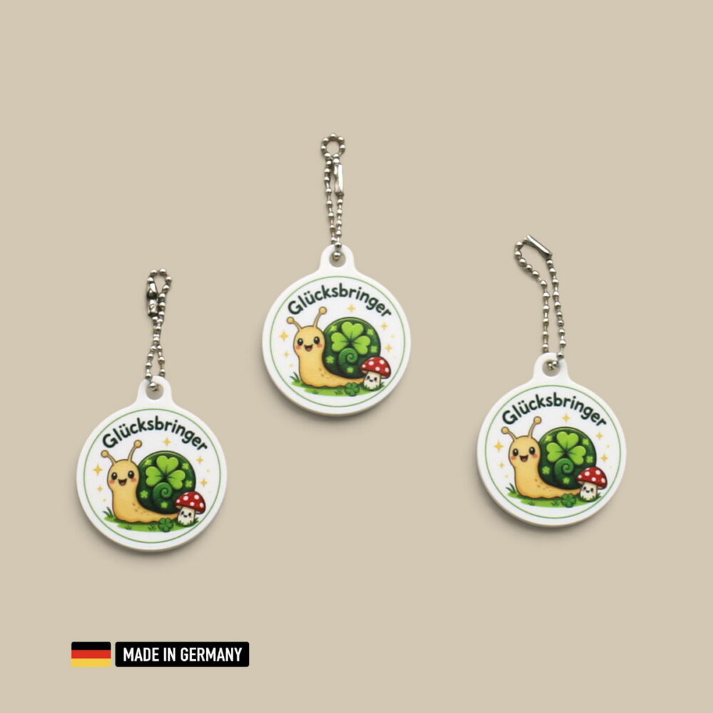 schnecke glücksbringer schlüsselanhänger mit glücks kleeblatt – niedliches motiv
