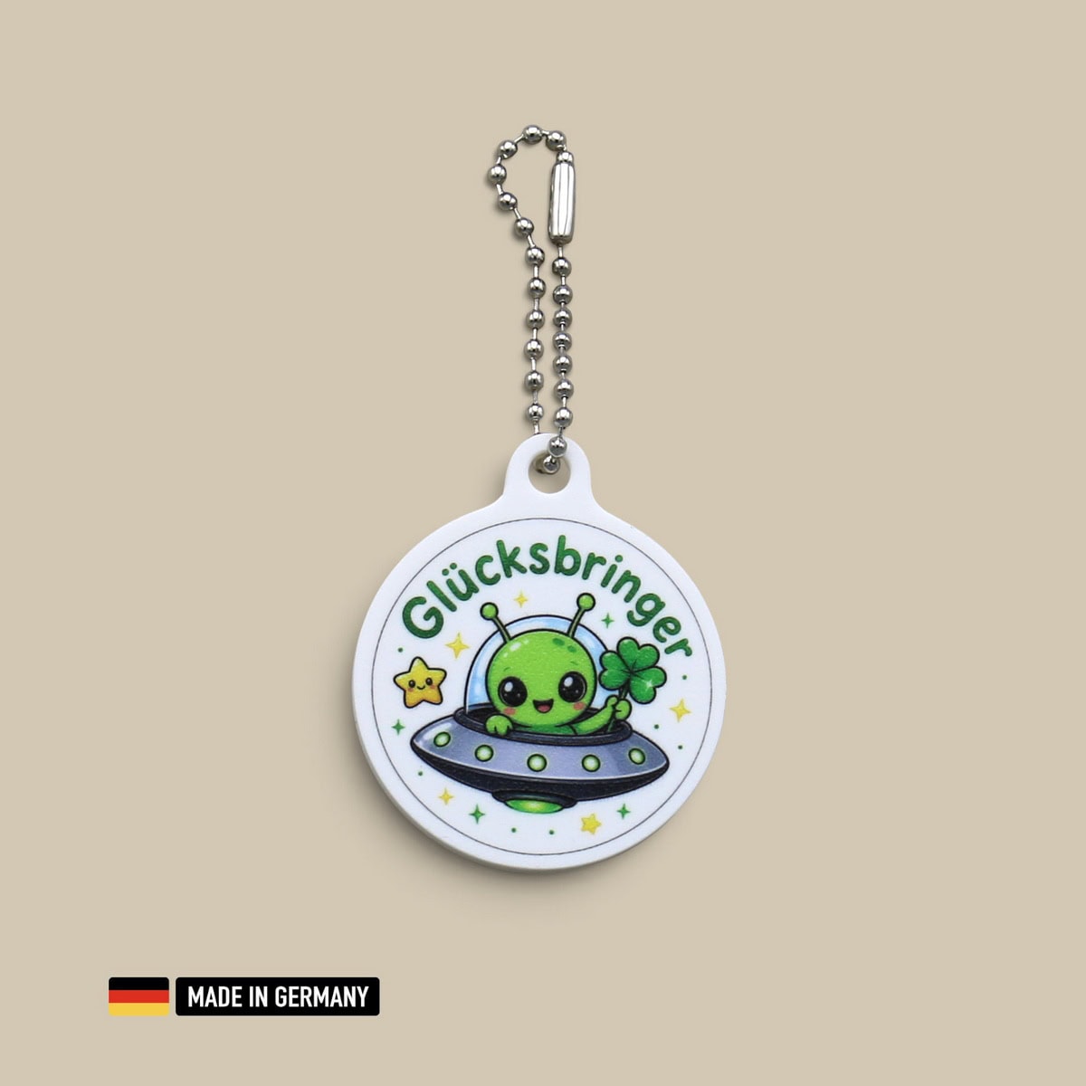 ufo mit alien glücksbringer schlüsselanhänger – außerirdischer mit glücks kleeblatt ufo mit alien glücksbringer schlüsselanhänger – außerirdischer mit glücks kleeblatt