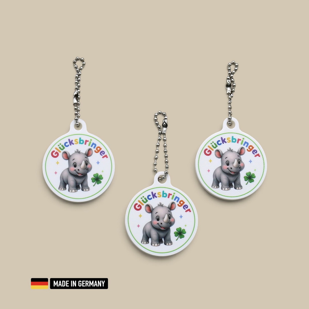 nashorn baby glücksbringer schlüsselanhänger mit glücks kleeblatt