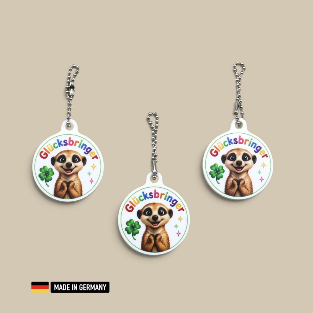 erdmännchen glücksbringer schlüsselanhänger mit glücks kleeblatt