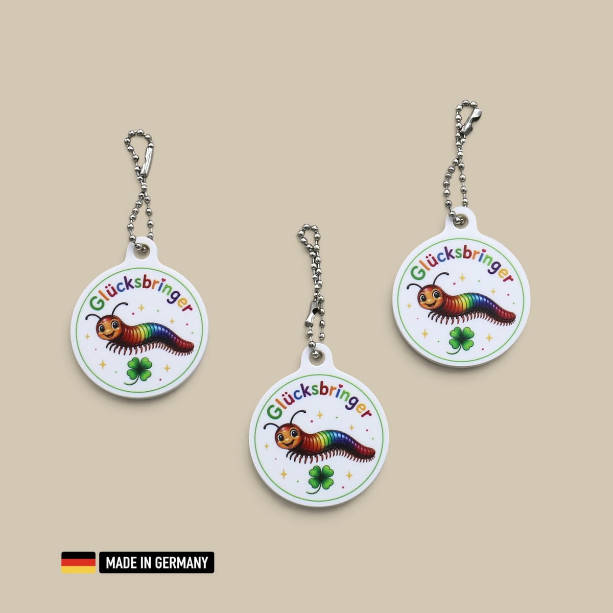 tausendfüßler glücksbringer schlüsselanhänger mit glücks kleeblatt