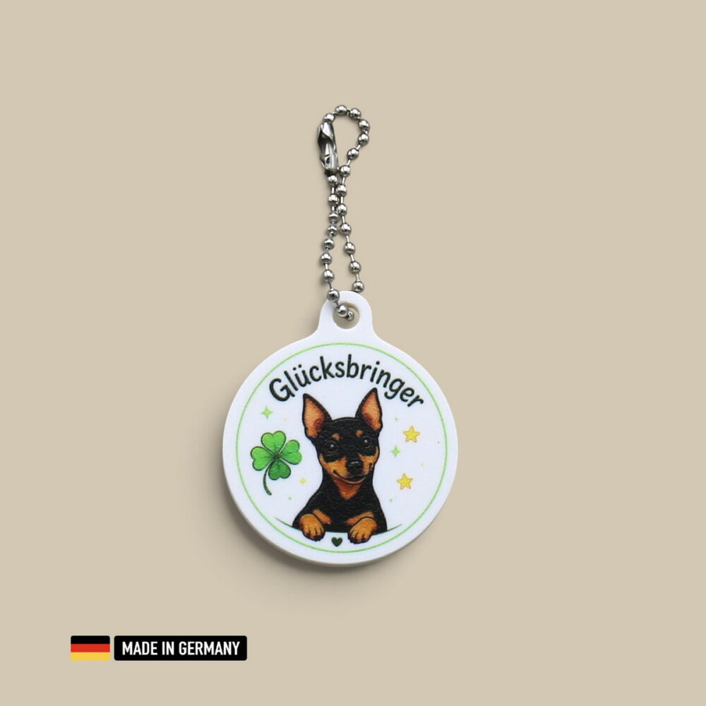 zwergpinscher welpe glücksbringer schlüsselanhänger mit glücks kleeblatt