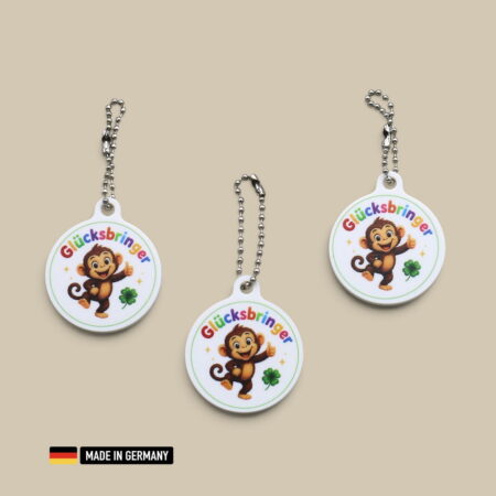 affenbaby glücksbringer schlüsselanhänger mit glücks kleeblatt