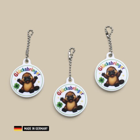 schnabeltier baby glücksbringer schlüsselanhänger mit glücks kleeblatt