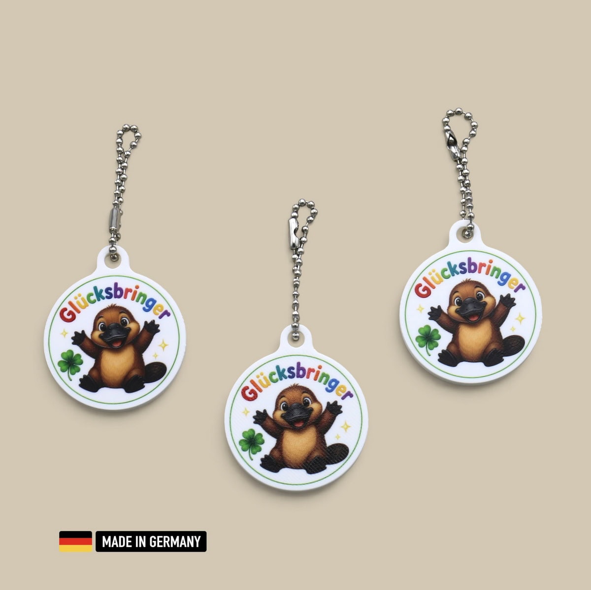 schnabeltier baby glücksbringer schlüsselanhänger mit glücks kleeblatt