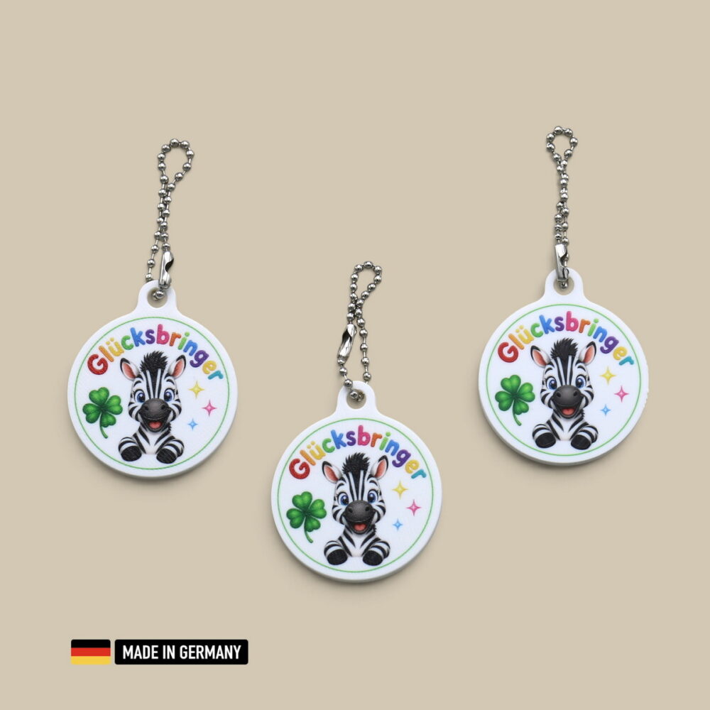 zebra folen glücksbringer schlüsselanhänger mit glücks kleeblatt