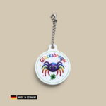 spinne bunt glücksbringer schlüsselanhänger mit glücks kleeblatt